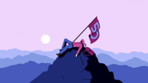 Guy on a mountain with 50 flag