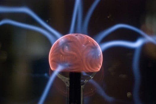 Brain-looking sphere with lighting bolts coming out of it to illustrate the importance of electrolyte supplements for the brain