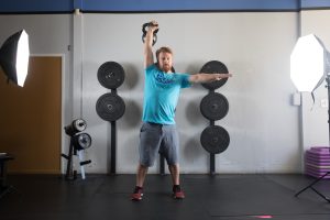 Snatch position to illustrate How To Accomplish Your Fitness Goals With A Single Kettlebell